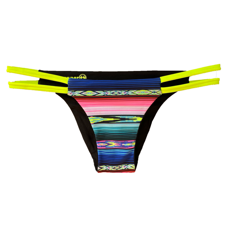  An attractive and stylish reversible sport bikini bottom featuring a colorful Mexican blanket serape print with two neon yellow colored straps on both hips; reverses to a solid black fabric.