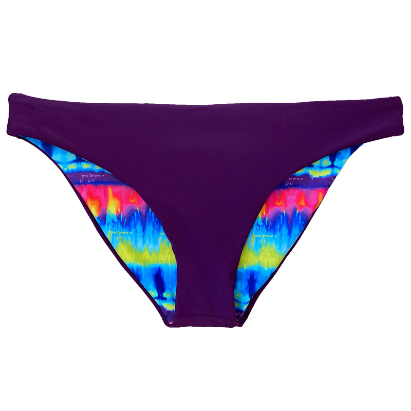 reversible sport bikini bottom modest mid rise Sunset beach volleyball surfing Pepper Swimwear colorful tie dye reverses to plum solid