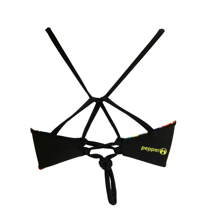 The back view of a solid black cross back sport bikini top with a knot tied in the strap to adjust the tightness.