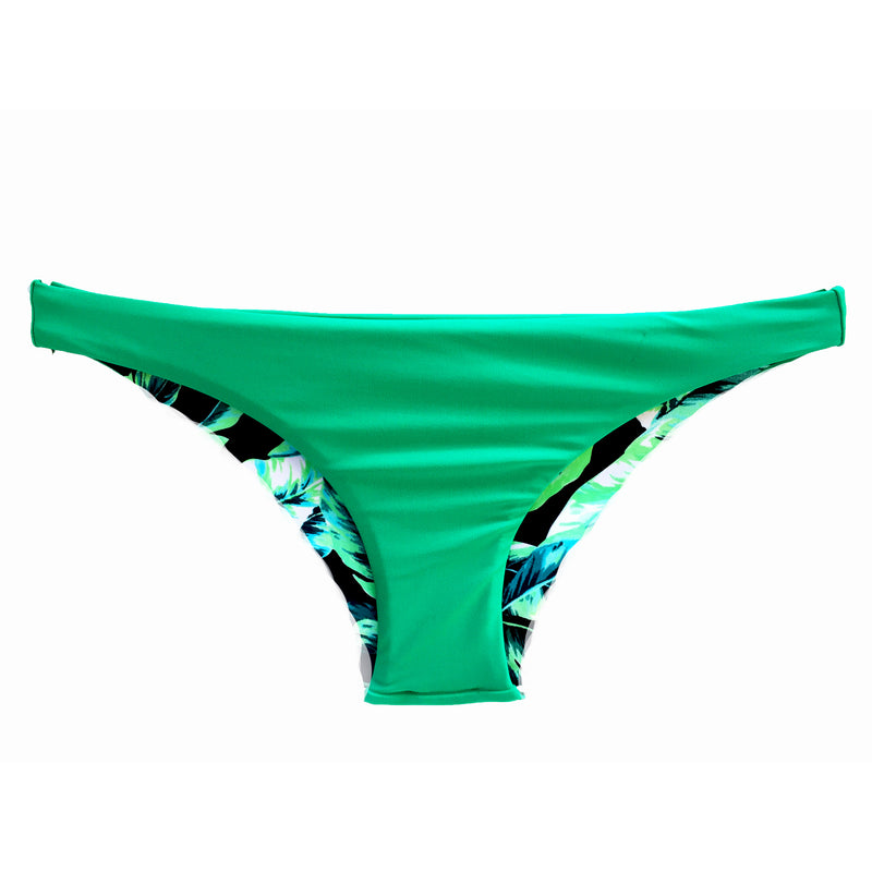 reversible sport bikini bottom cheeky mid rise Sunset beach volleyball surfing yoga paddle Pepper Swimwear solid green reverses to leaf print